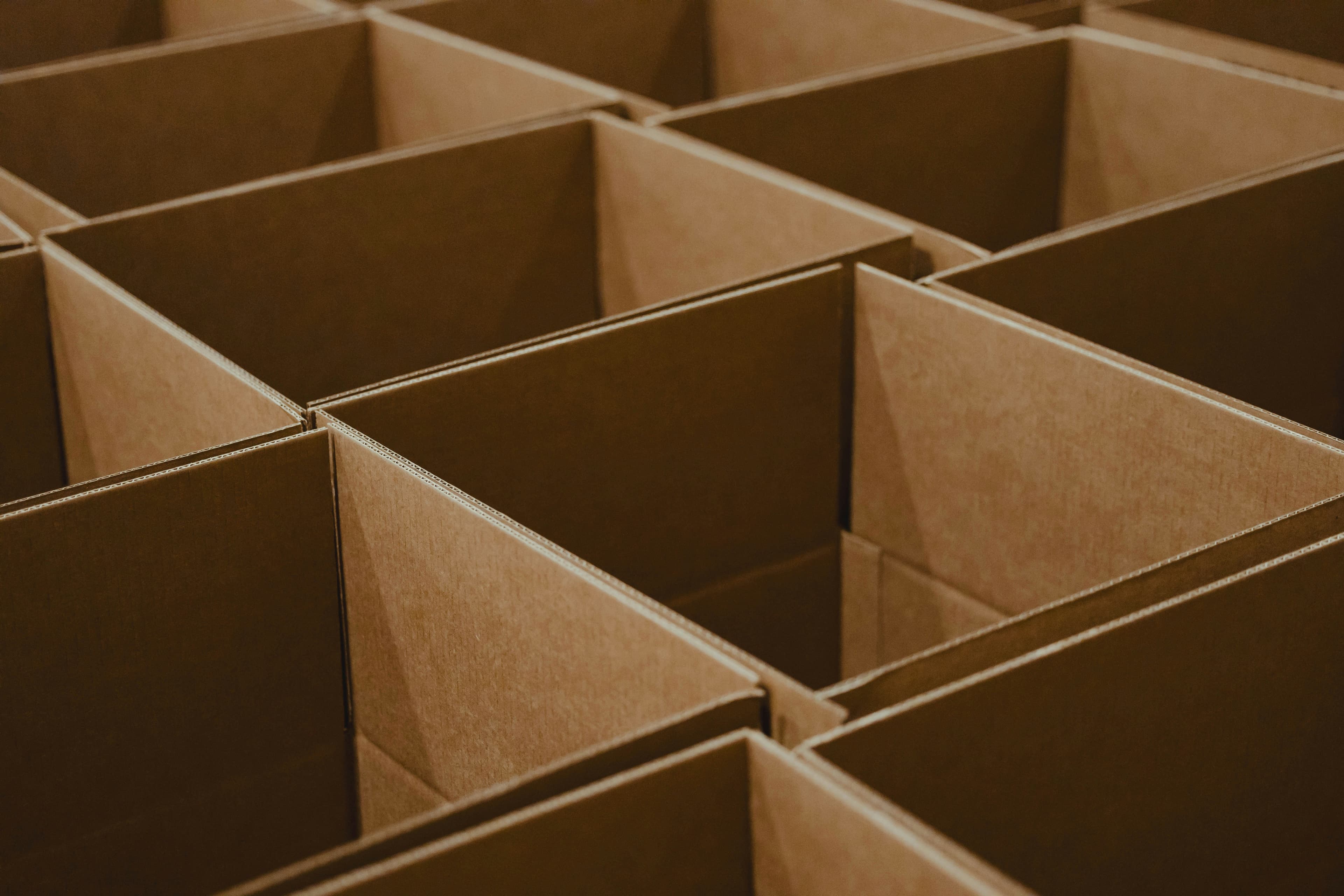 Rows of corrugated cartons ready for custom printing